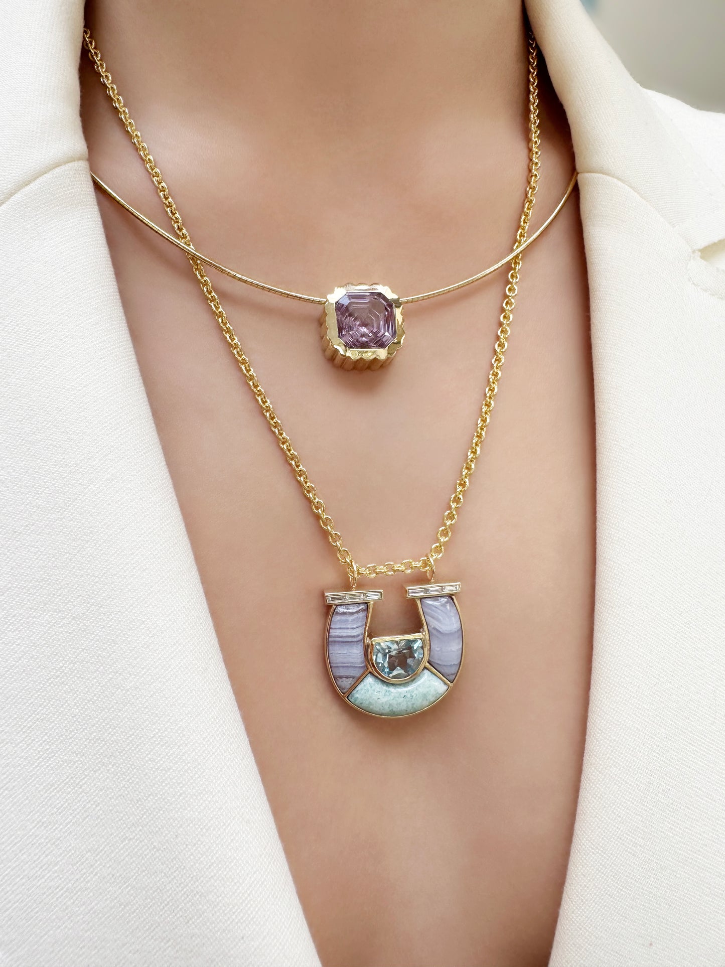 Sig Ward Jewelry 14K YG Jumbo Topaz, Lace Agate, Amazonite and Baguette Diamond Horseshoe Necklace and 14K YG Amethyst Omega Necklace featuring vibrant gemstones, baguette diamond accents, and elegant yellow gold luxury necklace designs.