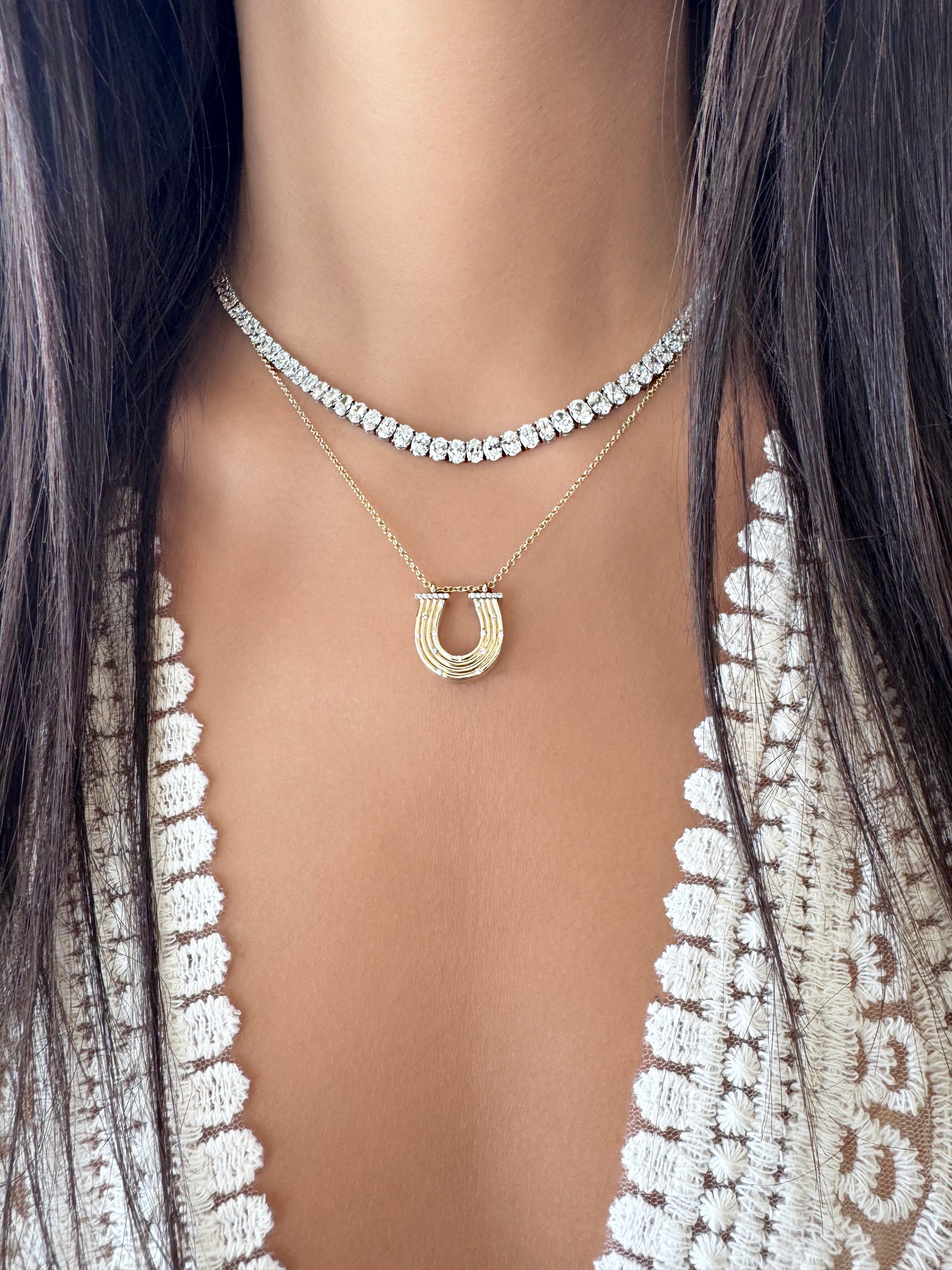 Sig Ward Jewelry 14K White Oval Shape with Diamond Tennis Necklace and 14K Yellow Gold Reeded Gold with Diamond Horseshoe Necklace on model