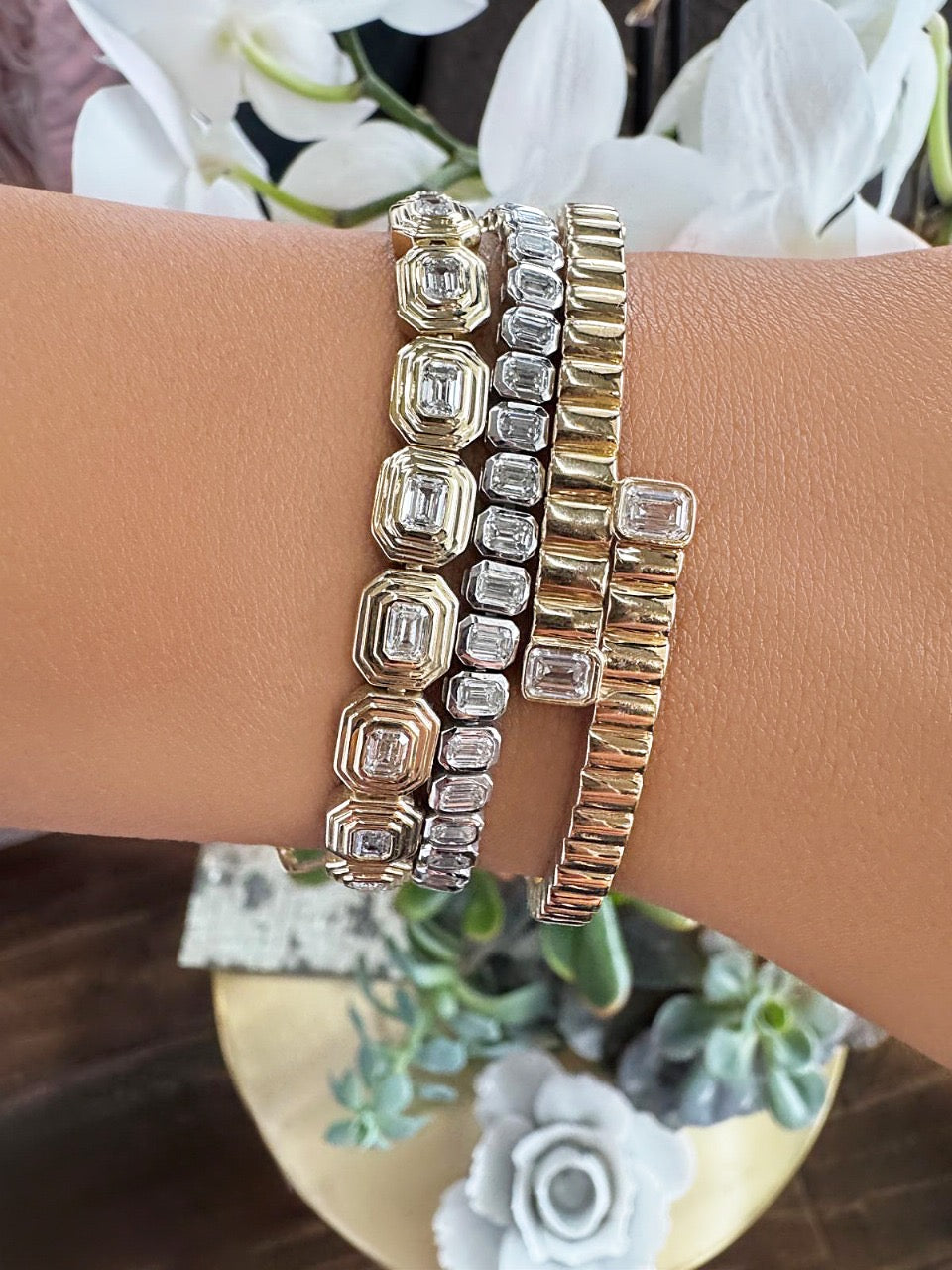 Sig Ward Jewelry Lifestyle 14K YG Maven Emerald Cut Diamond Bracelet featuring emerald cut diamonds in polished yellow gold, styled for everyday luxury.