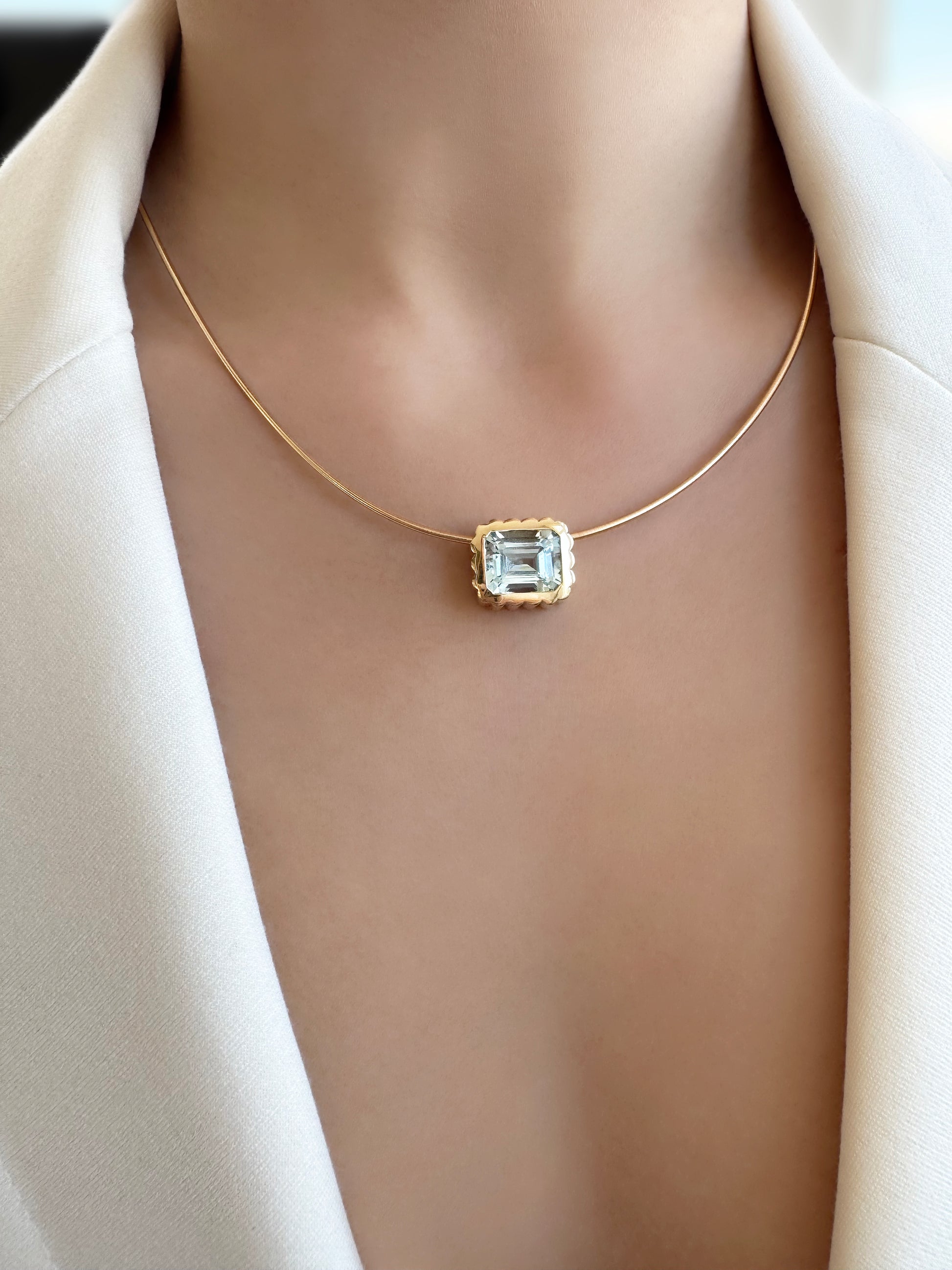 Sig Ward Jewelry 14K YG Aquamarine Omega Necklace featuring a stunning aquamarine gemstone paired with a sleek yellow gold omega chain design for an elegant and sophisticated luxury jewelry look.