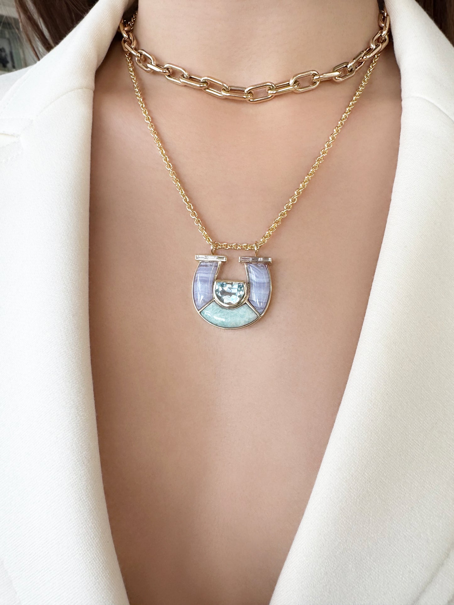 Sig Ward Jewelry 14K YG Jumbo Topaz, Lace Agate, Amazonite and Baguette Diamond Horseshoe Necklace featuring vibrant gemstones with baguette diamond accents set in a luxurious yellow gold horseshoe pendant design.