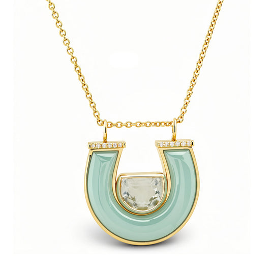 14K yellow gold medium horseshoe necklace featuring a prasiolite gemstone, chrysoprase accents, and sparkling round diamonds in a polished lucky horseshoe design.