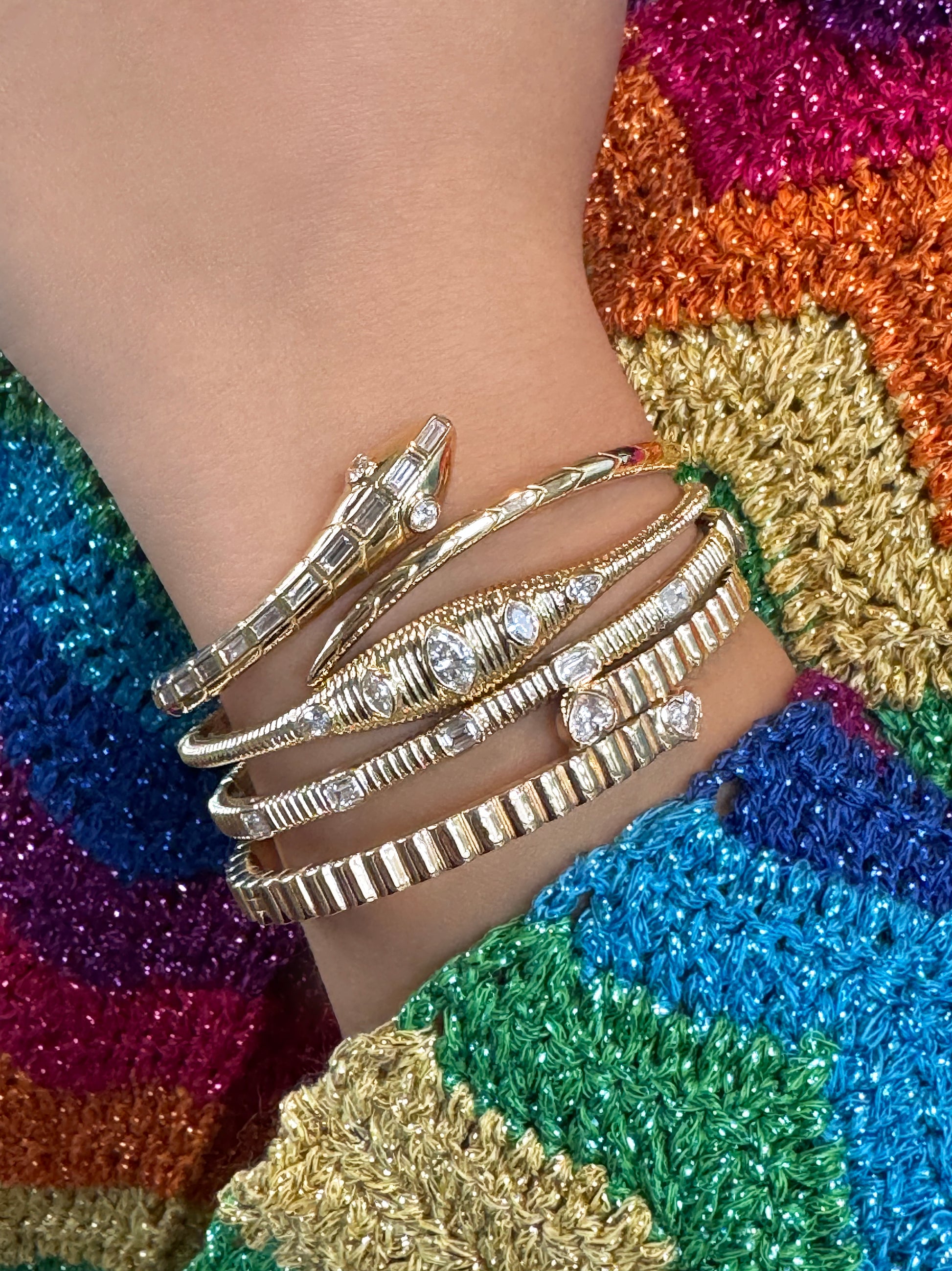 Sig Ward Jewelry 14K YG Nara Marquise and Pear Shaped Diamond Bangle and 18K YG Baguette Diamond Snake Bangle featuring exquisite diamond details in elegant yellow gold bangle designs for a luxurious statement look.