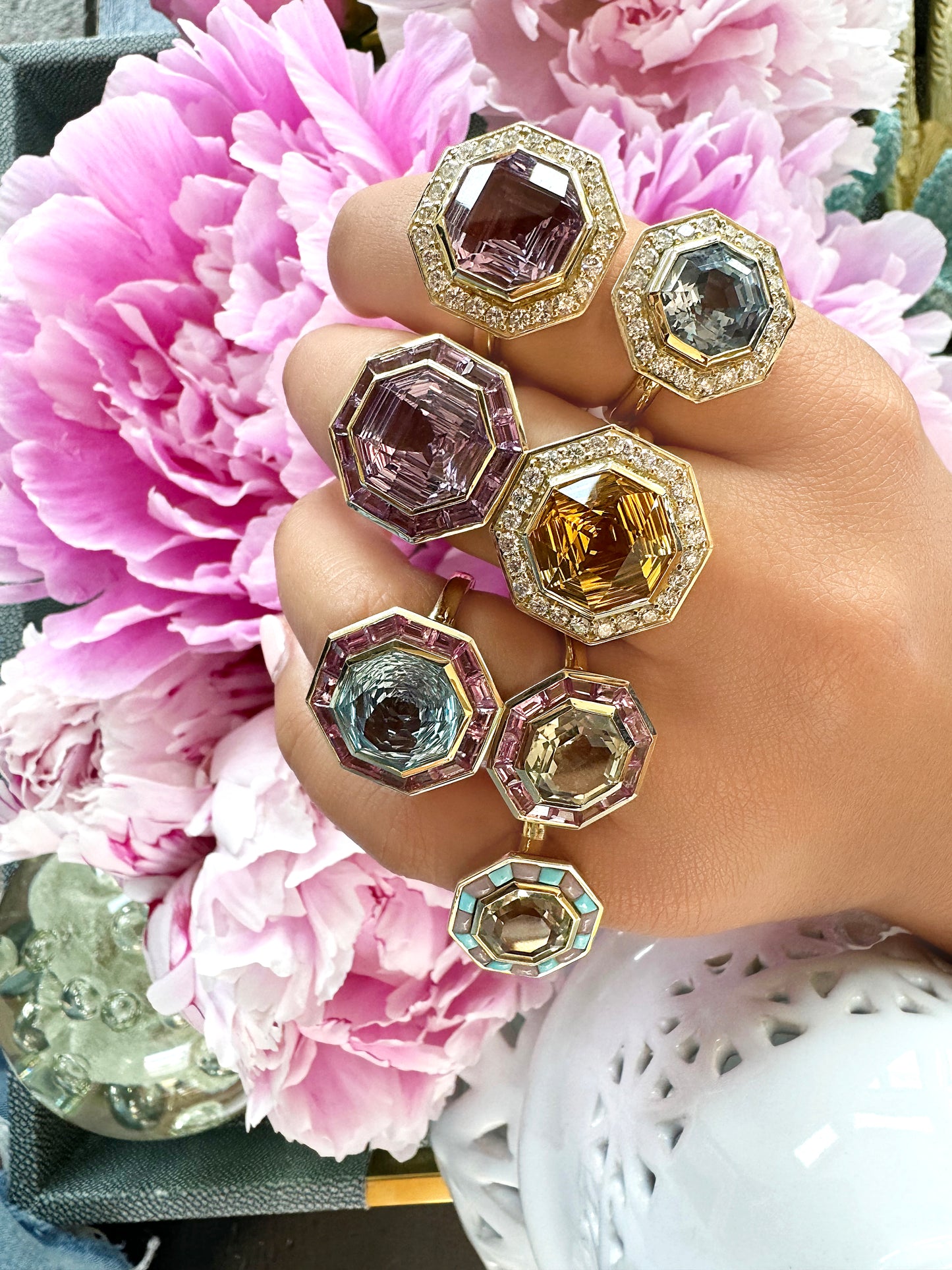Sig Ward Jewelry Lifestyle Featuring The 14K Yellow Gold Brazilian Aquamarine And Diamond Bia Ring With A Brazilian Aquamarine Center Stone And Diamond Accents.