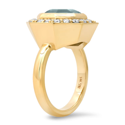 Sig Ward Jewelry Lifestyle Featuring The 14K Yellow Gold Brazilian Aquamarine And Diamond Bia Ring With A Brazilian Aquamarine Center Stone And Diamond Accents.