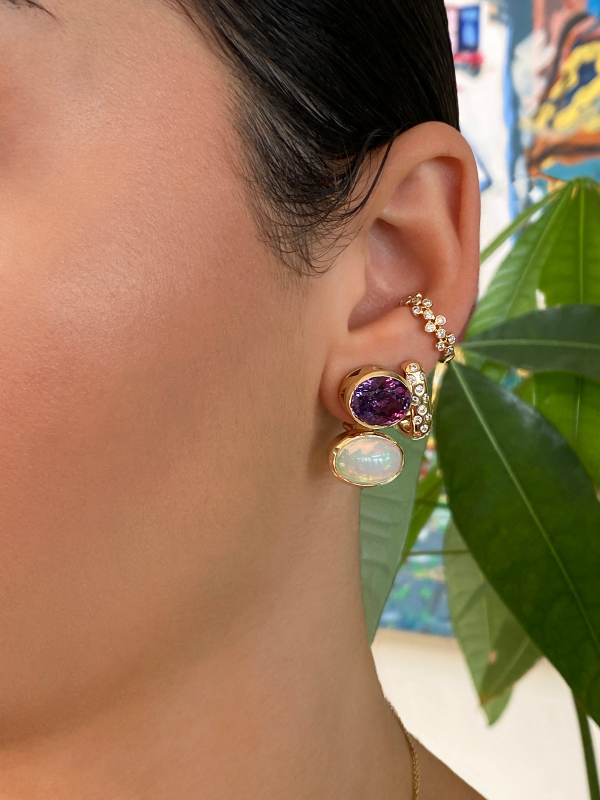 Sig Ward Jewelry Lifestyle Featuring The 14K Yellow Gold Opal And Amethyst Duo Earrings Showcasing Vibrant Opal And Amethyst Gemstones In A Modern Heirloom Design.