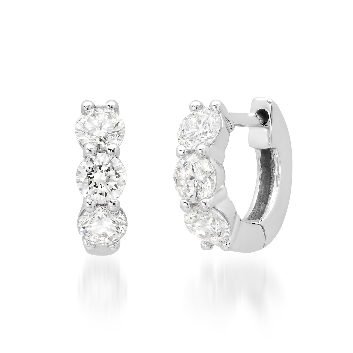 Sig Ward Jewelry 14K White Gold Emma Diamond Huggies featuring round brilliant diamonds set in polished 14K white gold huggie hoop earrings.