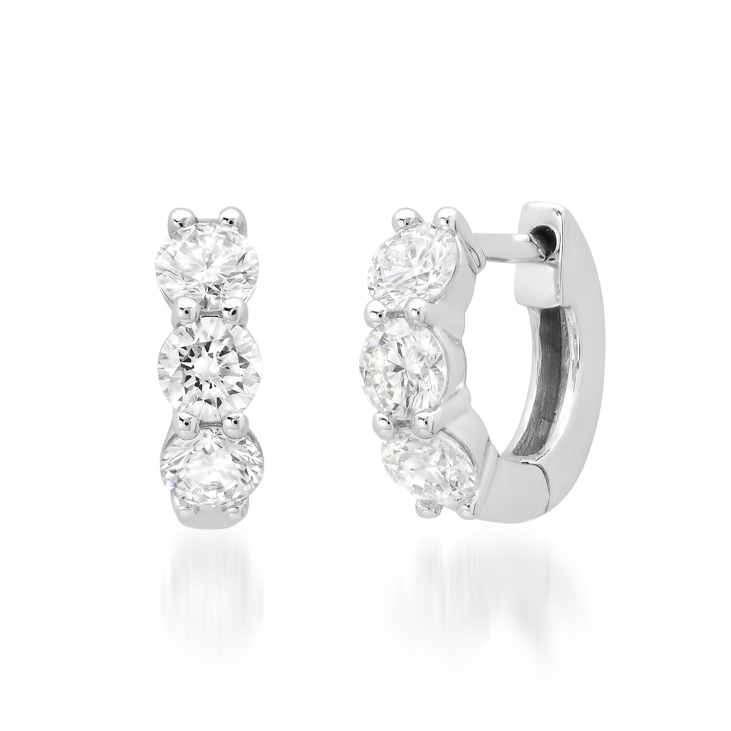 Sig Ward Jewelry 14K White Gold Emma Diamond Huggies featuring round brilliant diamonds set in polished 14K white gold huggie hoop earrings.
