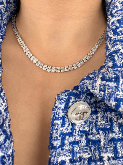 14K white gold oval-shaped diamond tennis necklace featuring graduated oval-cut white diamonds by Sig Ward Jewelry.