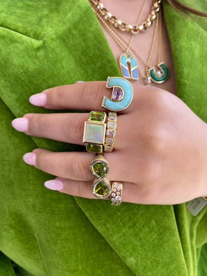 Sig Ward Jewelry 14K yellow gold Amethyst, Chrysoprase and Diamond Horseshoe Ring featuring natural amethyst, chrysoprase, and diamond accents in a handcrafted luxury fine jewelry design inspired by modern heirlooms and the symbolic horseshoe motif.
