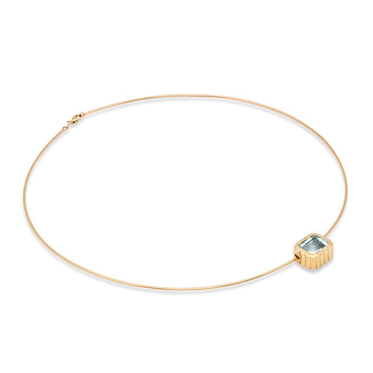 Sig Ward Jewelry 14K YG Aquamarine Omega Necklace featuring a captivating aquamarine gemstone set in polished yellow gold with a sleek omega necklace design for an elegant luxury jewelry statement.
