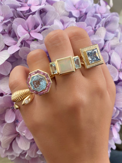 14K Yellow Gold Trilogy Ring Featuring Ethiopian Opal And Aquamarine By Sig Ward Jewelry.