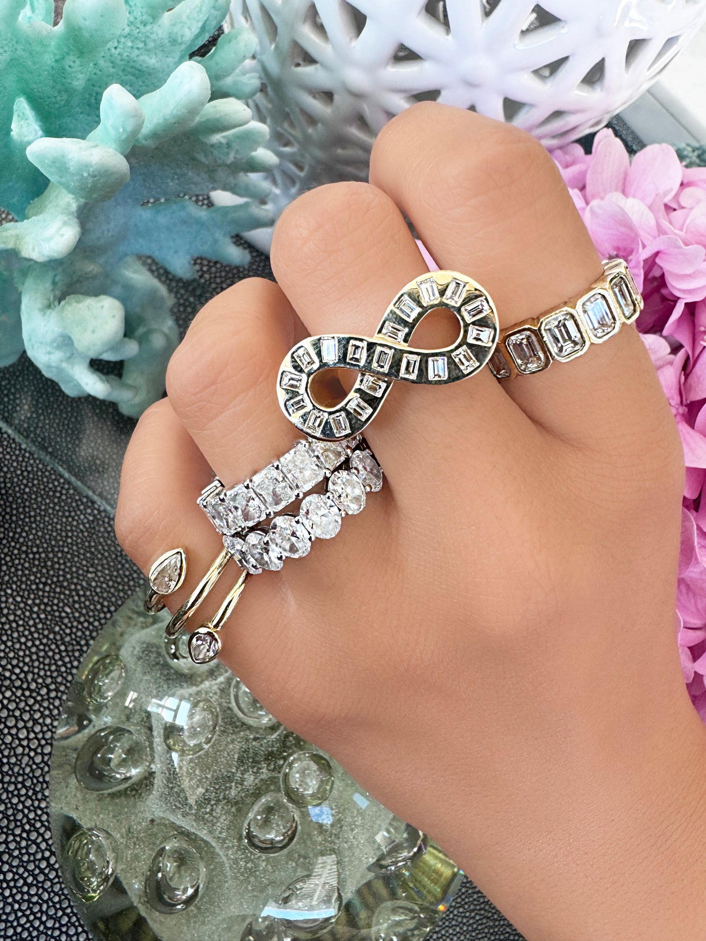 Sig Ward Jewelry 14K Yellow Gold Jumbo Baguette Diamond Infinity Ring, Pear Shape Diamond Snake Ring on model 