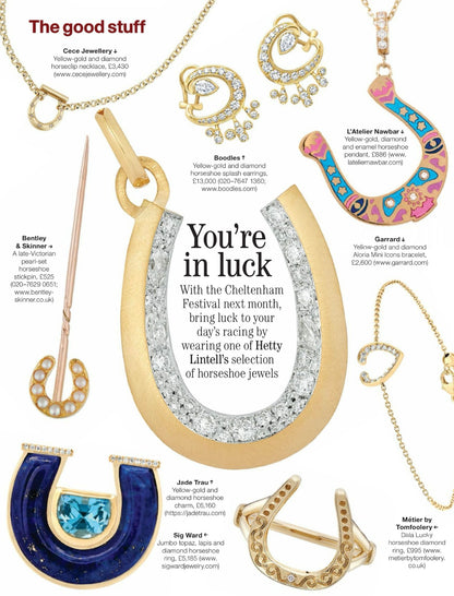 Sig Ward Jewelry Editorial 14K YG Jumbo Topaz, Lapis and Diamond Horseshoe Ring featuring a bold topaz gemstone, vibrant lapis accents, and diamond details in a luxurious yellow gold horseshoe ring design.
