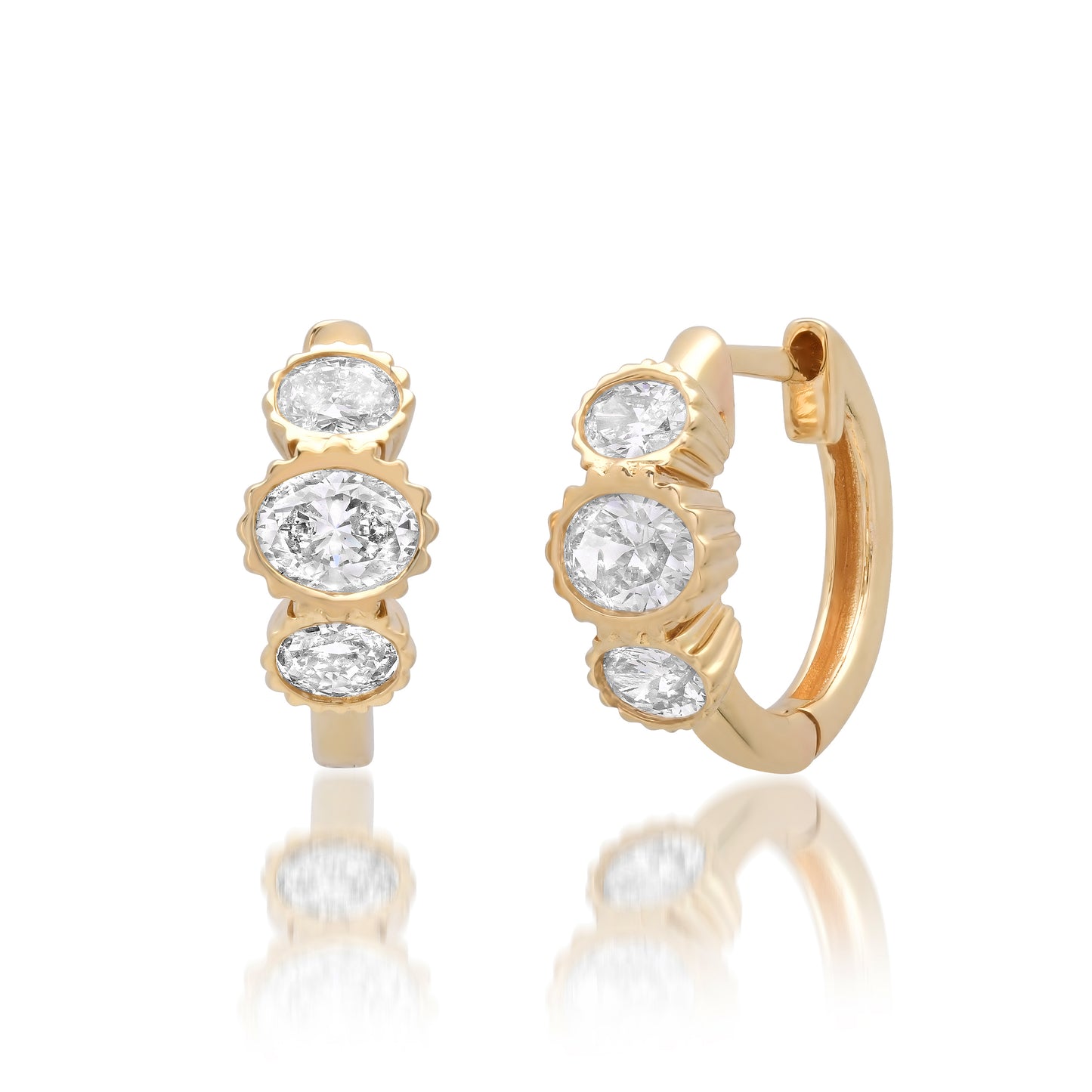 Front view of the Sig Ward Jewelry 14K Yellow Gold Laine Oval Shaped Diamond Huggies featuring an elegant oval silhouette accented with brilliant diamonds for a timeless everyday luxury look.