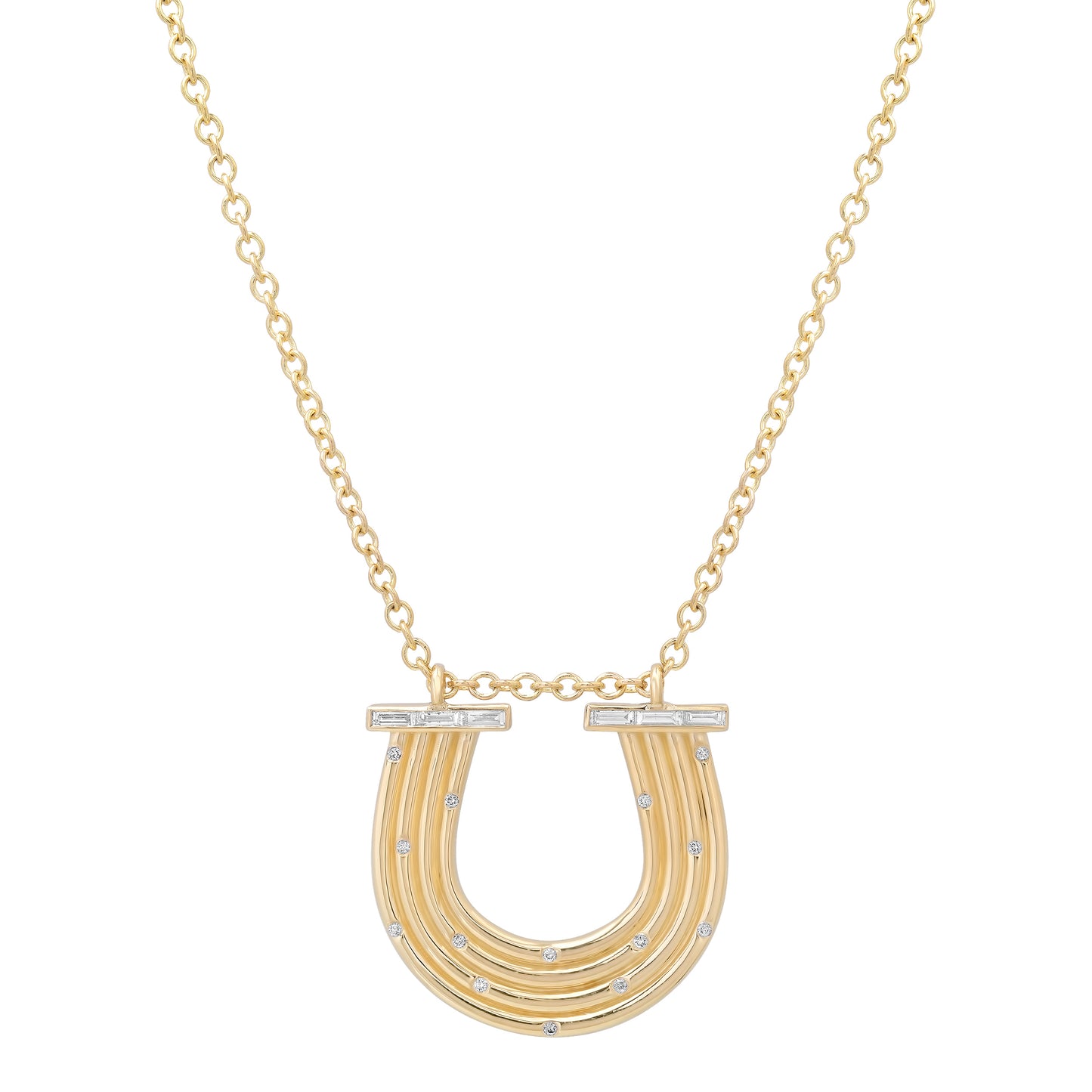 Close-up view of the 14K yellow gold Large Slim Reeded Baguette Diamond Horseshoe Necklace by Sig Ward Jewelry, showcasing natural baguette and round diamond accents, refined reeded detailing, and an elegant horseshoe pendant design.