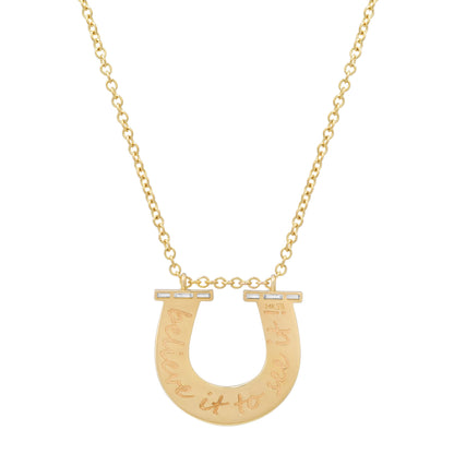 Close-up view of the 14K yellow gold Large Slim Reeded Baguette Diamond Horseshoe Necklace by Sig Ward Jewelry, showcasing natural baguette and round diamond accents, refined reeded detailing, and an elegant horseshoe pendant design.