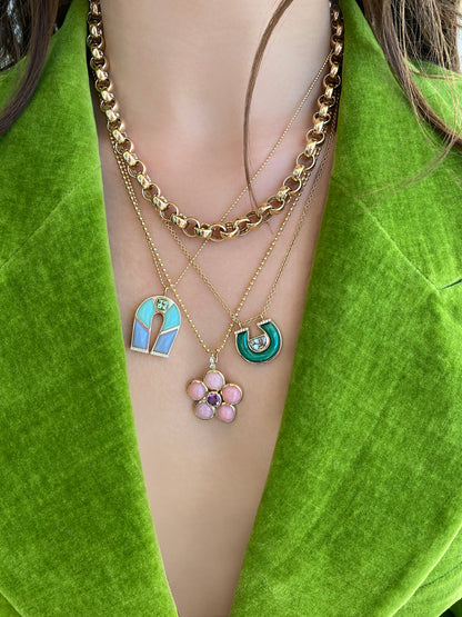 Sig Ward Jewelry 14K yellow gold Prasolite, Malachite and Diamond Horseshoe Necklace featuring natural prasolite, malachite, and diamond accents in a handcrafted luxury fine jewelry design inspired by modern heirlooms and the symbolic horseshoe motif.