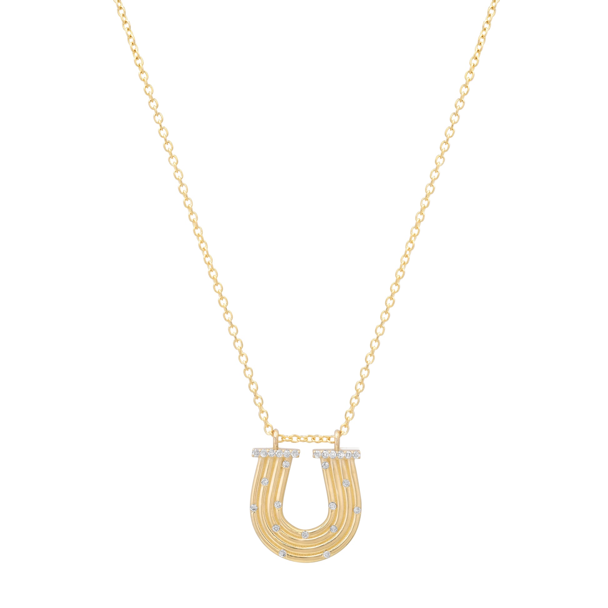 Close-up view of the 14K yellow gold Slim Reeded Diamond Horseshoe Necklace by Sig Ward Jewelry, featuring natural diamond accents, refined reeded detailing, and an elegant horseshoe pendant design.