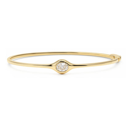 Sig Ward Jewelry 14K Yellow Gold Trina Oval Bangle with Diamond on white background