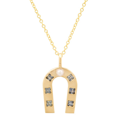 14K Yellow Gold Horseshoe Necklace Featuring Fresh Water Pearl And Blue Sapphire By Sig Ward Jewelry.