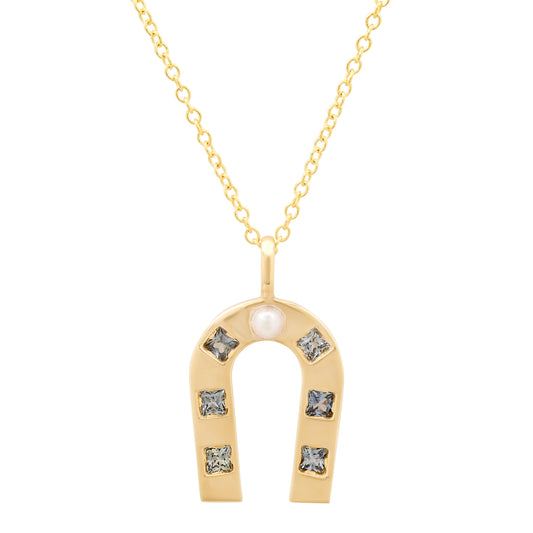 14K Yellow Gold Horseshoe Necklace Featuring Fresh Water Pearl And Blue Sapphire By Sig Ward Jewelry.
