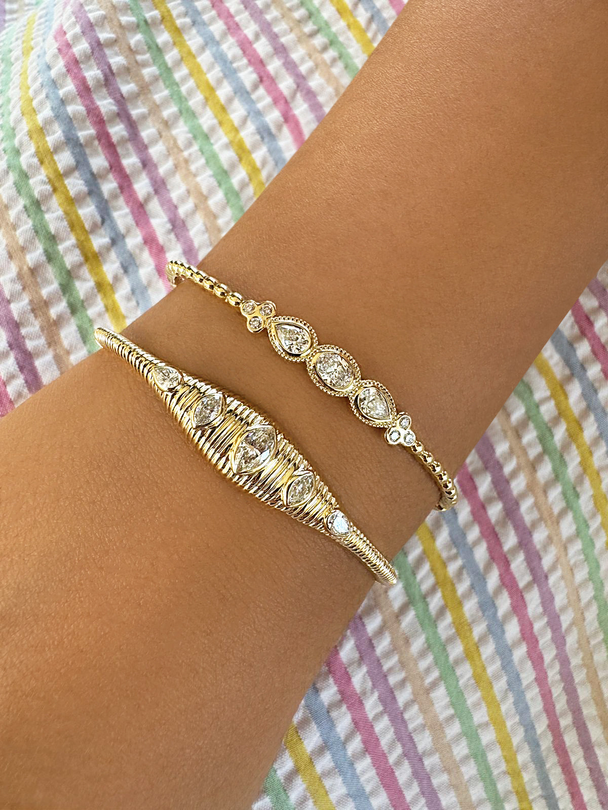 Sig Ward Jewelry 14K Yellow Gold Maven Oval, Pear and Round Shaped Diamond Bangle on model
