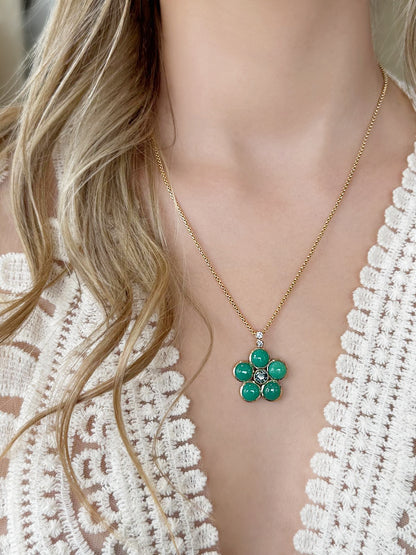 Lifestyle image featuring the 14K yellow gold Chrysoprase, Green Tourmaline, and Diamond Blossom Necklace by Sig Ward Jewelry, showcasing natural chrysoprase, green tourmaline, and diamond accents in an elegant floral-inspired necklace design.