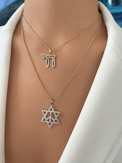 Sig Ward Jewelry 14K YG Diamond Star of David Necklace and Diamond Chai Necklace featuring brilliant diamonds set in polished 14K yellow gold symbolic pendant necklaces.