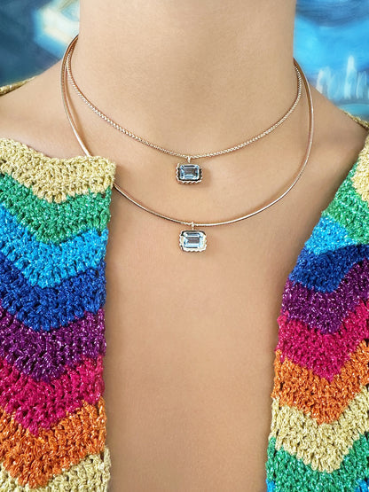 Sig Ward Jewelry Lifestyle 14K yellow gold Omega Mini Aquamarine Necklace featuring a bezel-set aquamarine gemstone with a refined modern design.