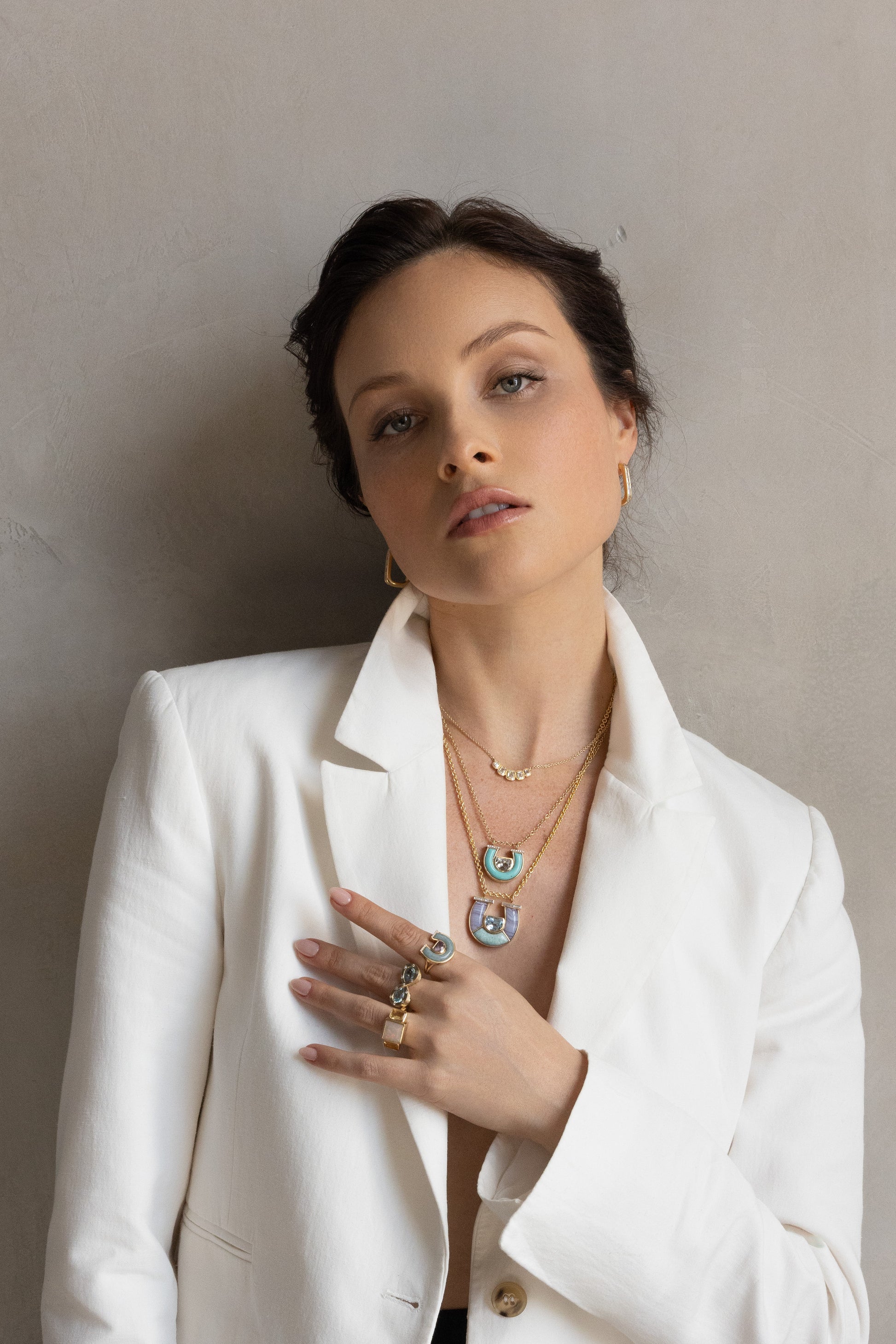 Sig Ward Jewelry Lifestyle 18K YG Brooke Baguette Diamond Earrings featuring baguette cut diamonds in polished 18K yellow gold, styled for a modern luxury look.