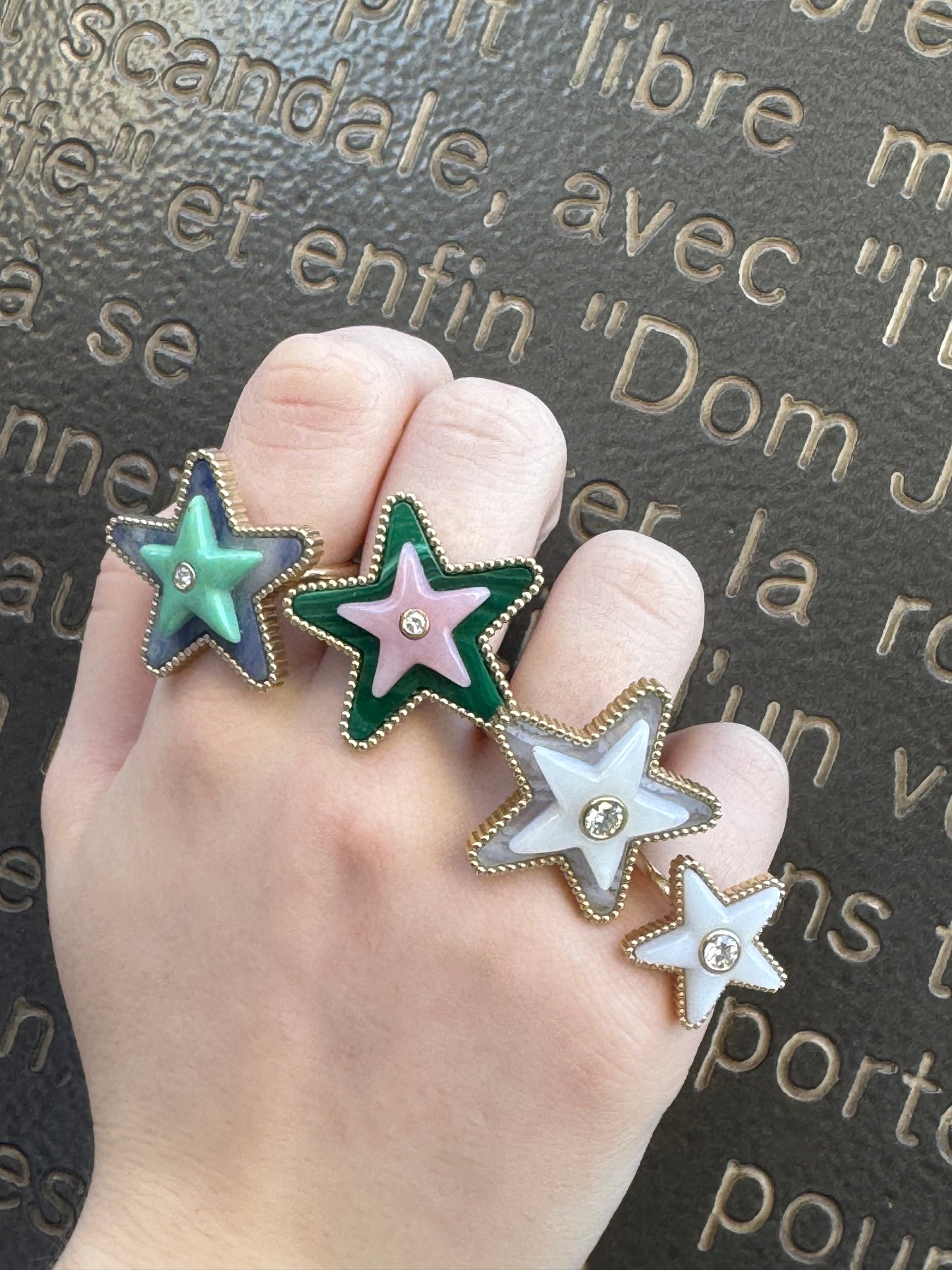 Sig Ward Jewelry Mega Star Power ring collection featuring the Tolite, Minty Turquoise and Diamond Ring alongside the Malachite, Pink Opal and Diamond Ring, showcasing vibrant natural gemstones, brilliant diamonds, and bold celestial-inspired designs crafted in fine jewelry for modern luxury.