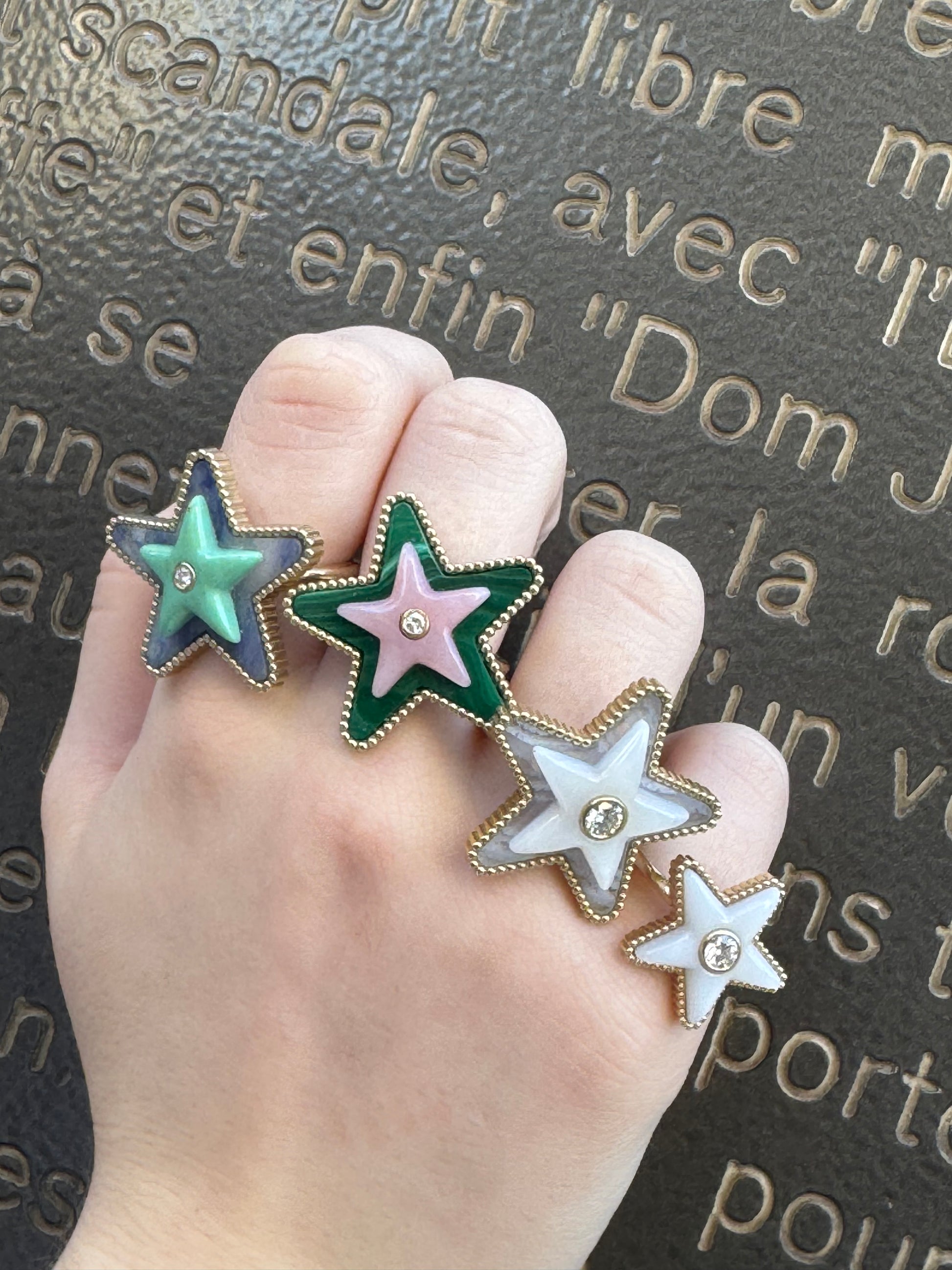 Sig Ward Jewelry Mega Star Power ring collection featuring the Tolite, Minty Turquoise and Diamond Ring alongside the Malachite, Pink Opal and Diamond Ring, showcasing vibrant natural gemstones, brilliant diamonds, and bold celestial-inspired designs crafted in fine jewelry for modern luxury.