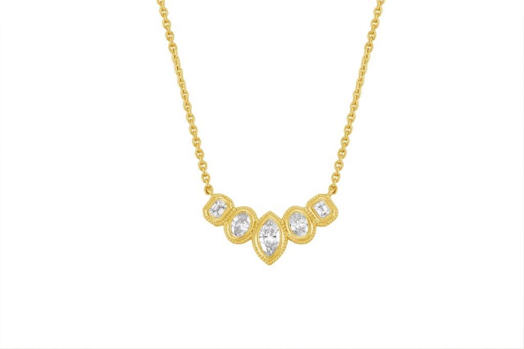 Sig Ward Jewelry Stellar Marquise, Oval and Emerald Cut Diamond Bib Necklace featuring a striking arrangement of marquise, oval, and emerald cut diamonds in an elegant bib-style statement necklace.