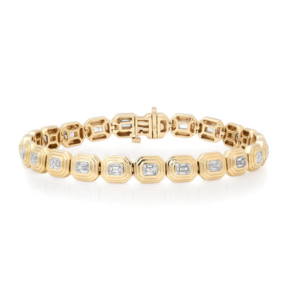 Sig Ward Jewelry 14K YG Maven Emerald Cut Diamond Bracelet featuring emerald cut diamonds in a polished 14K yellow gold bracelet.