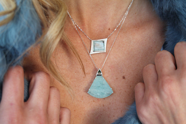 14K WG Aquamarine, blue diamond trillion and diamond baguette necklace