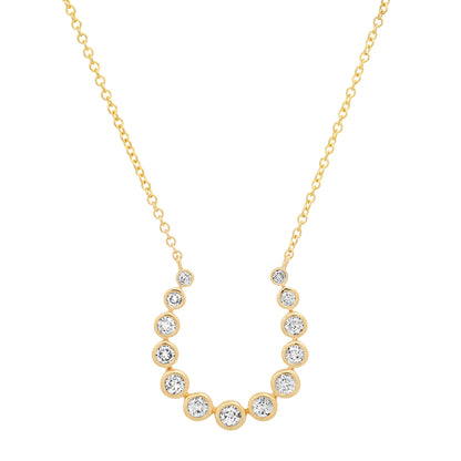 Sig Ward Jewelry 14K yellow gold horseshoe necklace featuring sparkling diamond accents, a luxury fine jewelry piece with an elegant design symbolizing luck, protection, and timeless beauty.