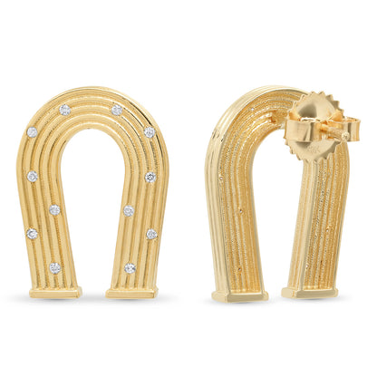 Sig Ward Jewelry 14K yellow gold horseshoe earrings featuring diamond accents and reeded gold detailing, a luxury fine jewelry piece with an elegant design symbolizing luck, protection, and timeless beauty.