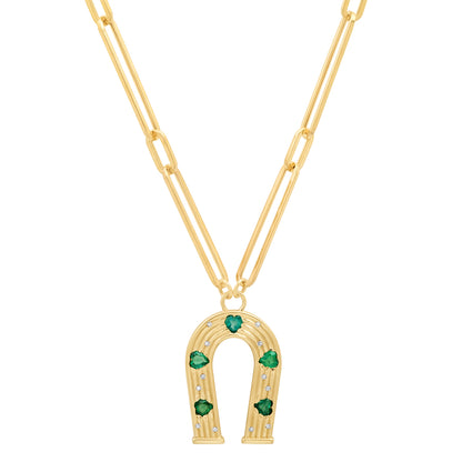 Sig Ward Jewelry 14K yellow gold horseshoe necklace featuring emerald and diamond accents, a luxury gemstone jewelry piece with an elegant design symbolizing luck, protection, and timeless beauty.