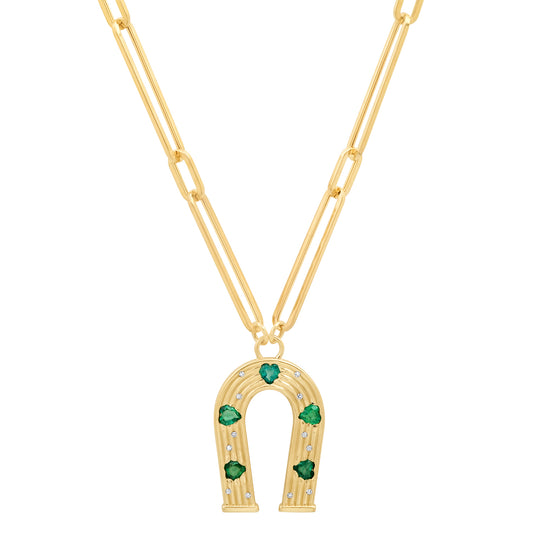 Sig Ward Jewelry 14K yellow gold horseshoe necklace featuring emerald and diamond accents, a luxury gemstone jewelry piece with an elegant design symbolizing luck, protection, and timeless beauty.