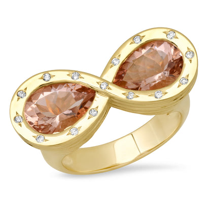 Sig Ward Jewelry 14K yellow gold infinity ring featuring morganite and diamond accents, a luxury gemstone ring with an elegant and timeless design.