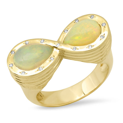 Sig Ward Jewelry 14K yellow gold infinity ring featuring opal and diamond accents, a luxury gemstone ring with an elegant and timeless design.