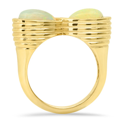 Sig Ward Jewelry 14K yellow gold infinity ring featuring opal and diamond accents, a luxury gemstone ring with an elegant and timeless design.