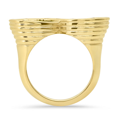 Sig Ward Jewelry 14K yellow gold infinity ring featuring peridot and diamond accents, a luxury gemstone ring with an elegant and timeless design.