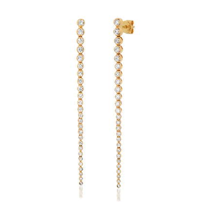 Sig Ward Jewelry 14K yellow gold tennis diamond earrings featuring a row of sparkling diamonds, a luxury fine jewelry piece with a timeless and elegant design.